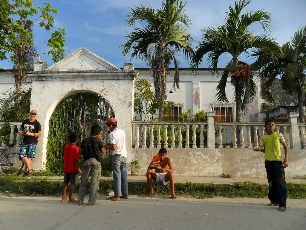 Freemason lodge in Aracataca Colombia with locals outside, reflecting real life behind Macondo.