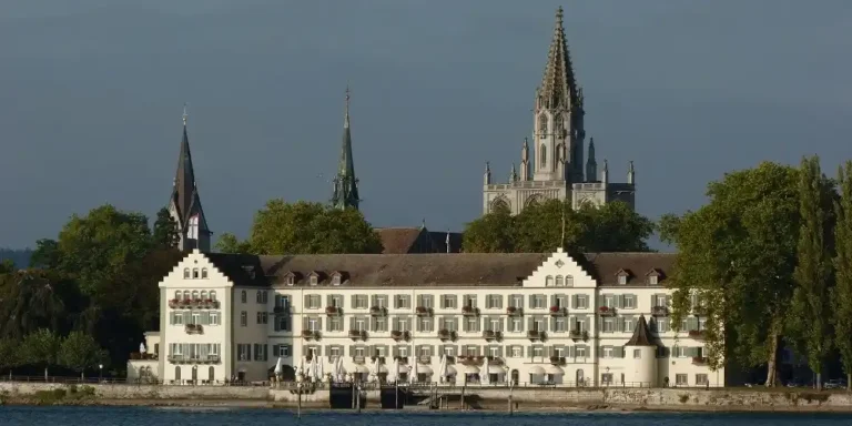 Historic waterfront buildings and church towers in Konstanz on Lake Constance.