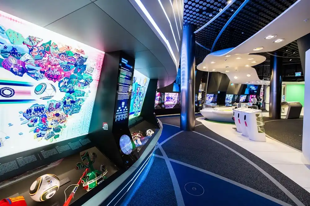 Interactive World Cup Gallery inside the FIFA World Football Museum in Zurich with colourful football displays and digital exhibits.