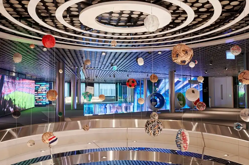 Hanging football-inspired art installation inside the FIFA World Football Museum in Zurich.